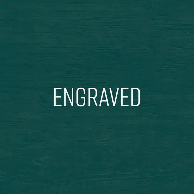 Green background with "Engraved" written on it.